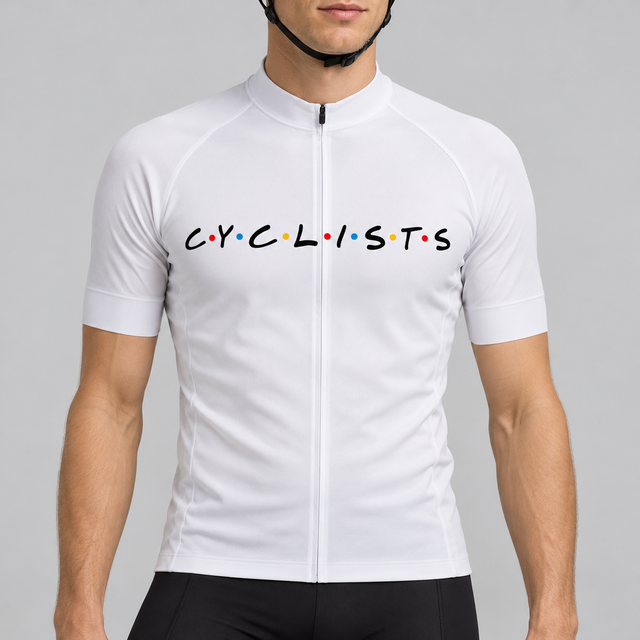 Male model wearing the white short-sleeve C.Y.C.L.I.S.T.S cycling jersey with black chest lettering and coloured dots, shown from the chin down with black cycling shorts against a neutral studio background.