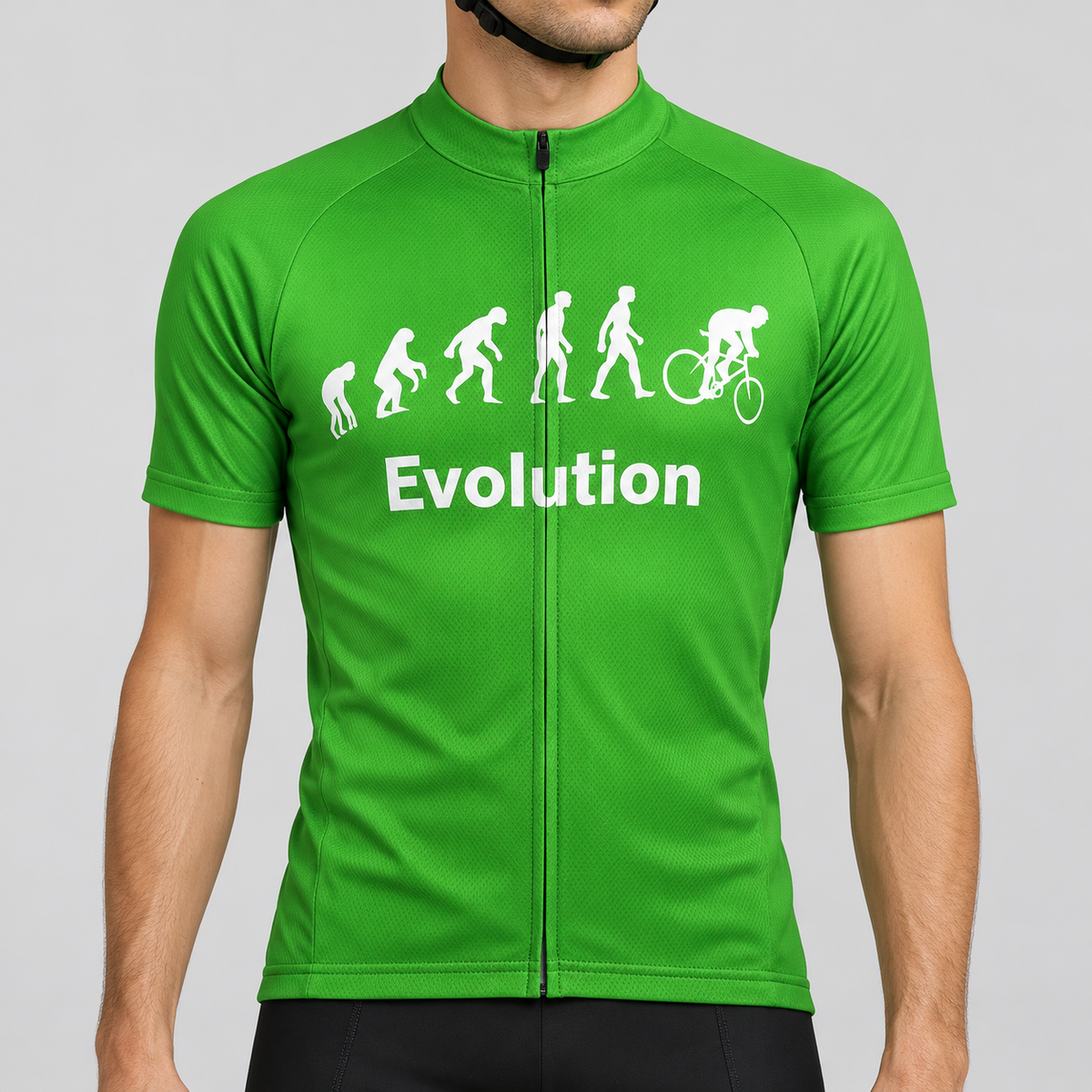 Male model wearing the bright green Evolution Of Man short-sleeve cycling jersey with white evolution silhouettes, cyclist graphic and Evolution wording, shown from the chin down against a neutral studio background.