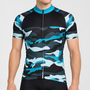 Male model wearing the short-sleeve Blue Camouflage cycling jersey with turquoise collar and blue, grey and black camouflage pattern, shown from the chin down with black cycling shorts against a neutral studio background.