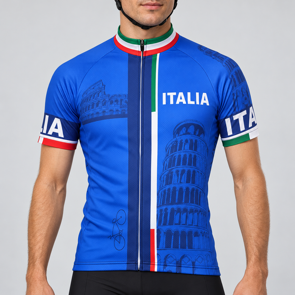 Male model wearing the royal blue short-sleeve Italia cycling jersey with Italian tricolour details, ITALIA lettering and landmark graphics, shown from the chin down with black cycling shorts against a neutral studio background.
