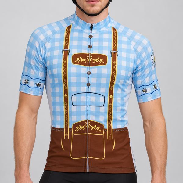 Male model wearing the pale blue and white checked short-sleeve Lederhosen cycling jersey with printed brown braces, floral panels and edelweiss sleeve details, shown from the chin down with black cycling shorts against a neutral studio background.
