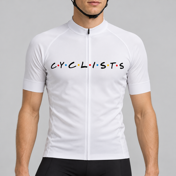 Male model wearing the white short-sleeve C.Y.C.L.I.S.T.S cycling jersey with black chest lettering and coloured dots, shown from the chin down with black cycling shorts against a neutral studio background.