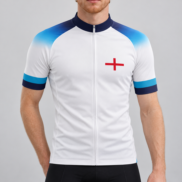 Male model wearing the white England 2022 football-inspired short-sleeve cycling jersey with blue gradient shoulders, navy and turquoise cuffs and a red St George cross, shown from the chin down against a neutral studio background.