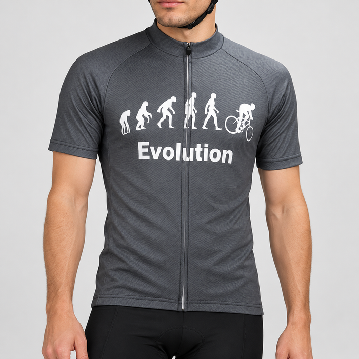 Male model wearing the grey Evolution Of Man short-sleeve cycling jersey with white evolution silhouettes, cyclist graphic and Evolution wording, shown from the chin down against a neutral studio background.