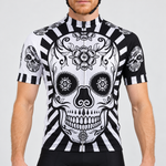 Male model wearing the black and white short-sleeve Flower Skull Print cycling jersey with floral skull graphics and striped trim, shown from the lower lip down with black cycling shorts against a neutral studio background.