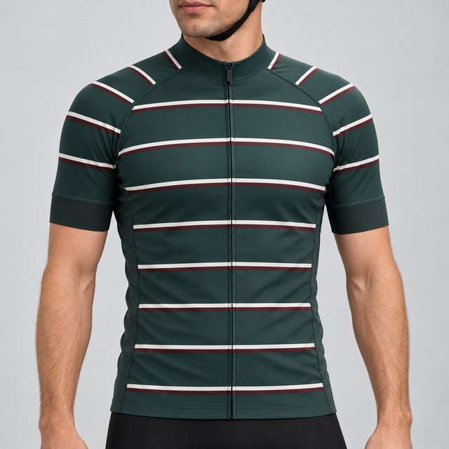 Male model wearing the dark green short-sleeve GG BASICS Green Hoops cycling jersey with cream and burgundy horizontal stripes, shown with black cycling shorts against a light grey studio background.