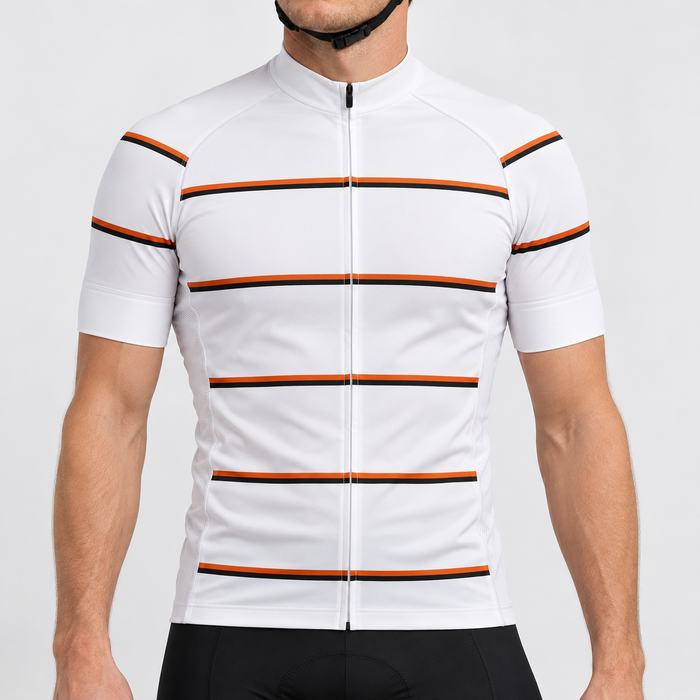 Male model wearing the white short-sleeve GG BASICS White Hoops cycling jersey with repeated orange and black stripes, shown with black cycling shorts against a light grey studio background.